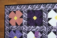 Ellie’s African Violet crib quilt