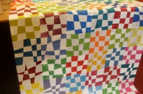 rho’s quilt made of wonky checkerboard blocks…