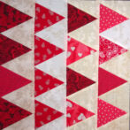 Four red triangle blocks